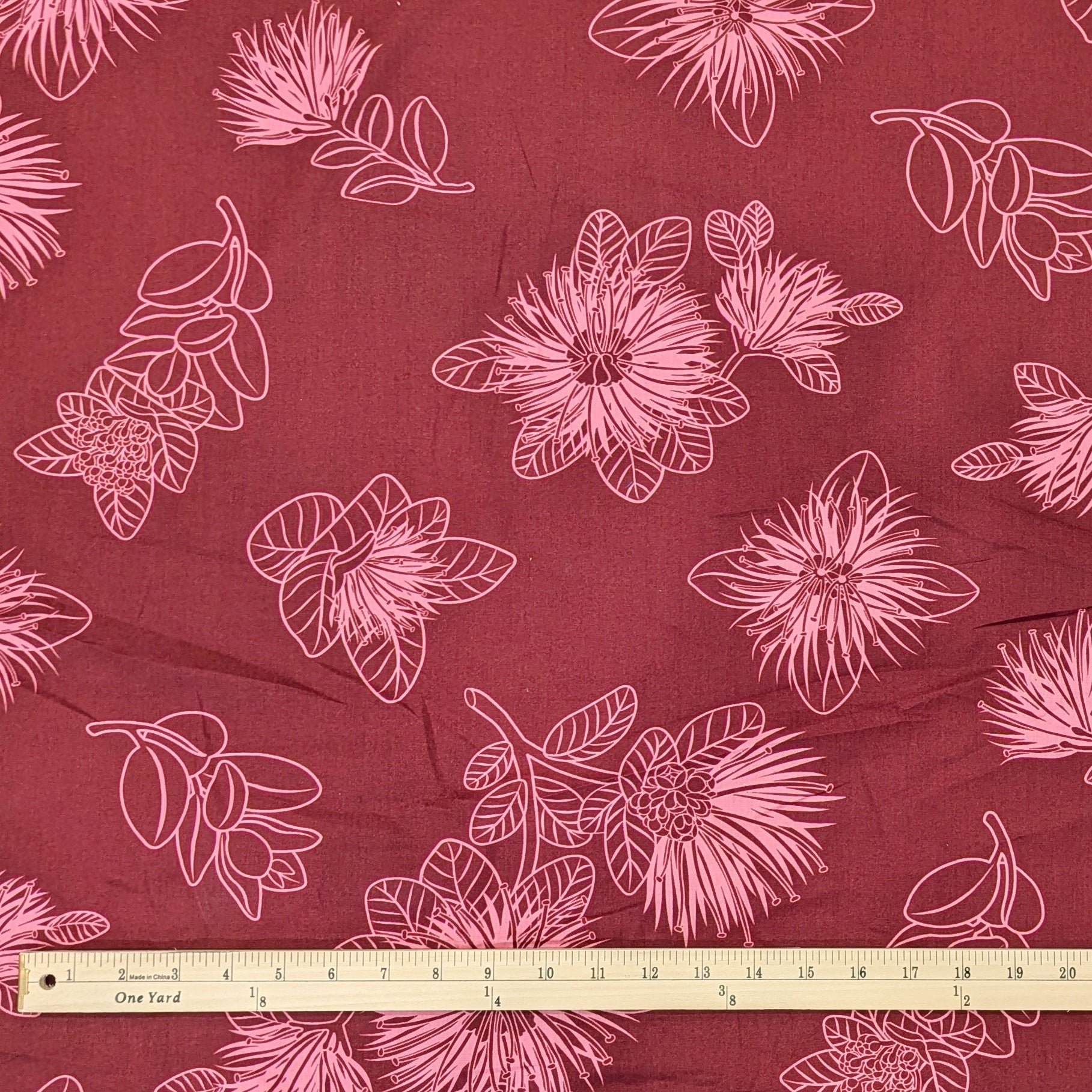 Light Maroon Hawaiian Fabric with Ohia Flower Print