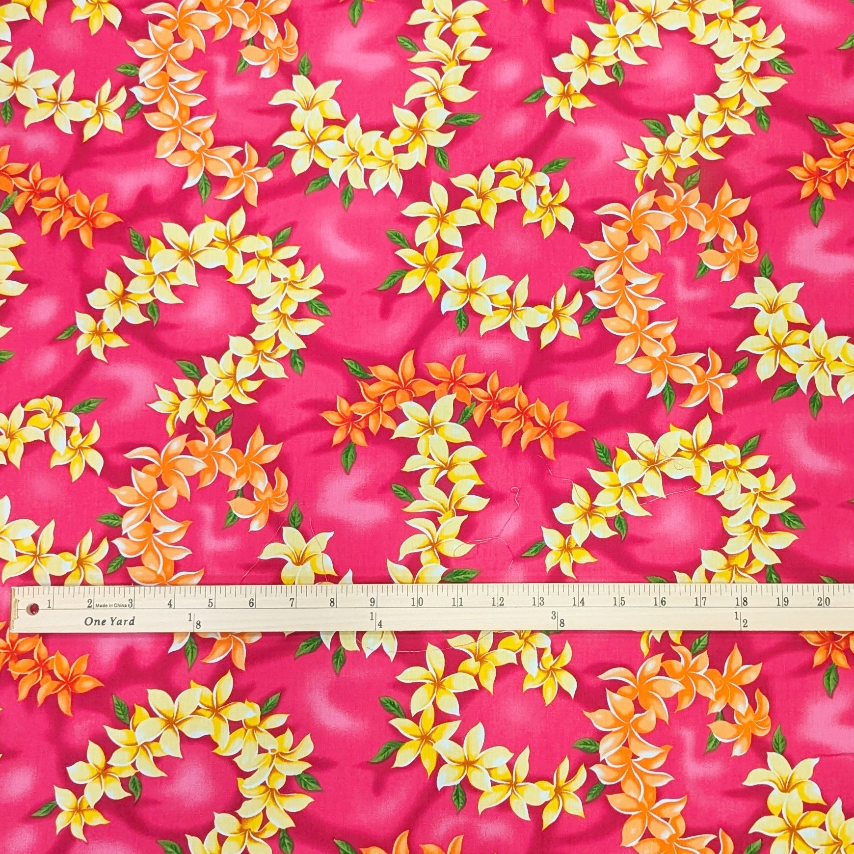 YellowPlumeriaLeiHawaiianFabricPink