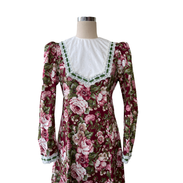 Large Roses Maroon Color Dress with Contrasting Green Ribbon with white Lace